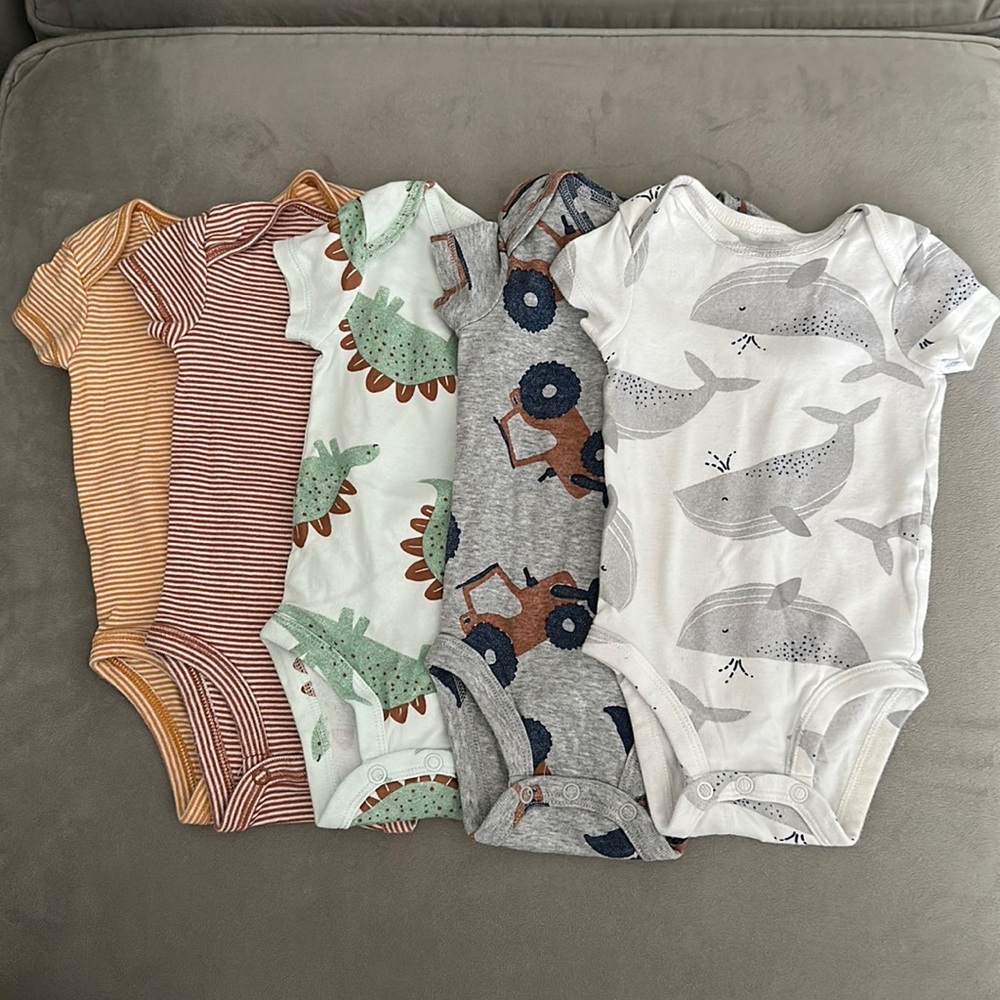 5 Carters Onsies in like new condition, no stains.